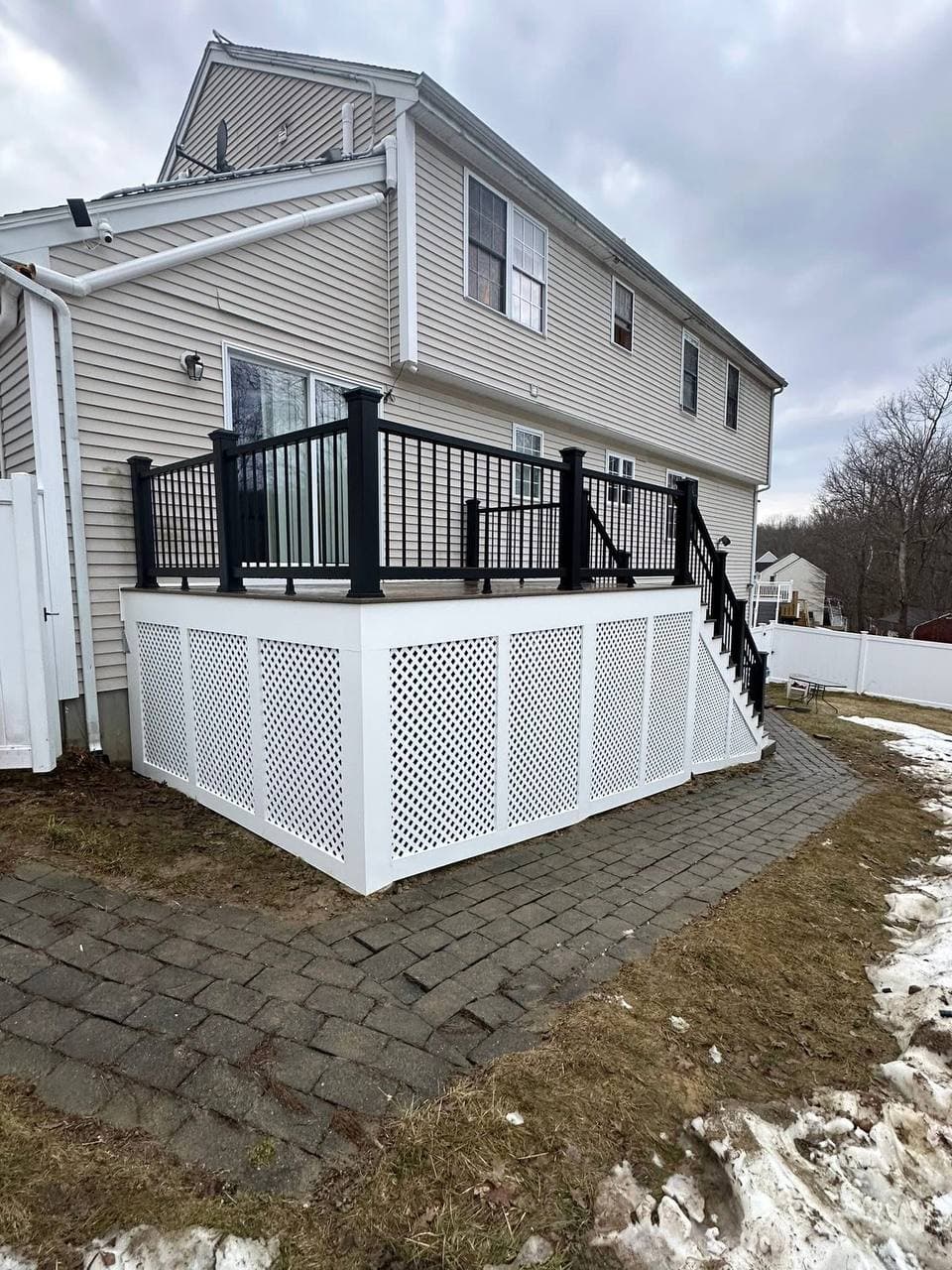 Composite deck with metal handrailing, wider view, by Rahimi Custom Construction